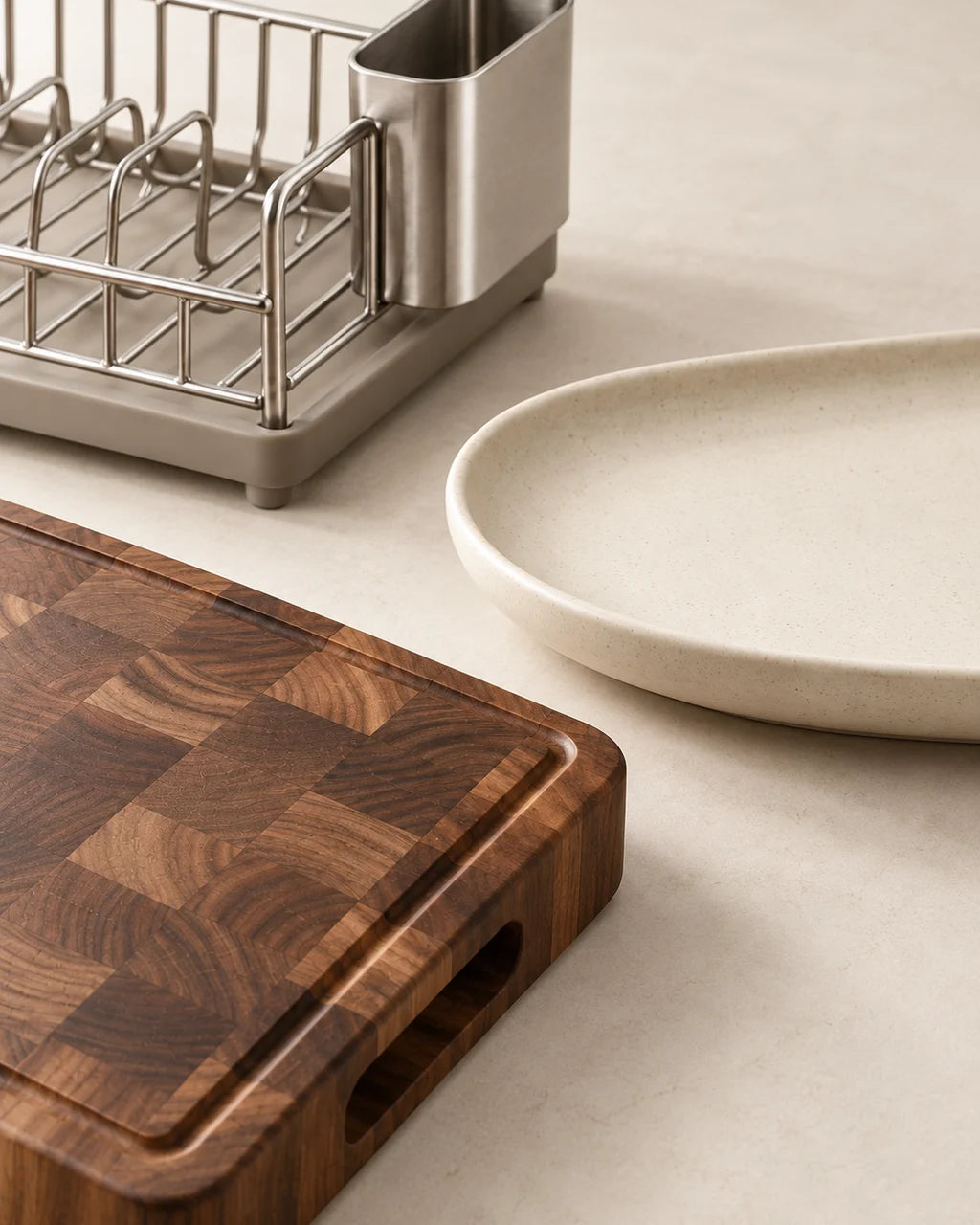 Close view of wood grain, cream ceramic and brushed steel